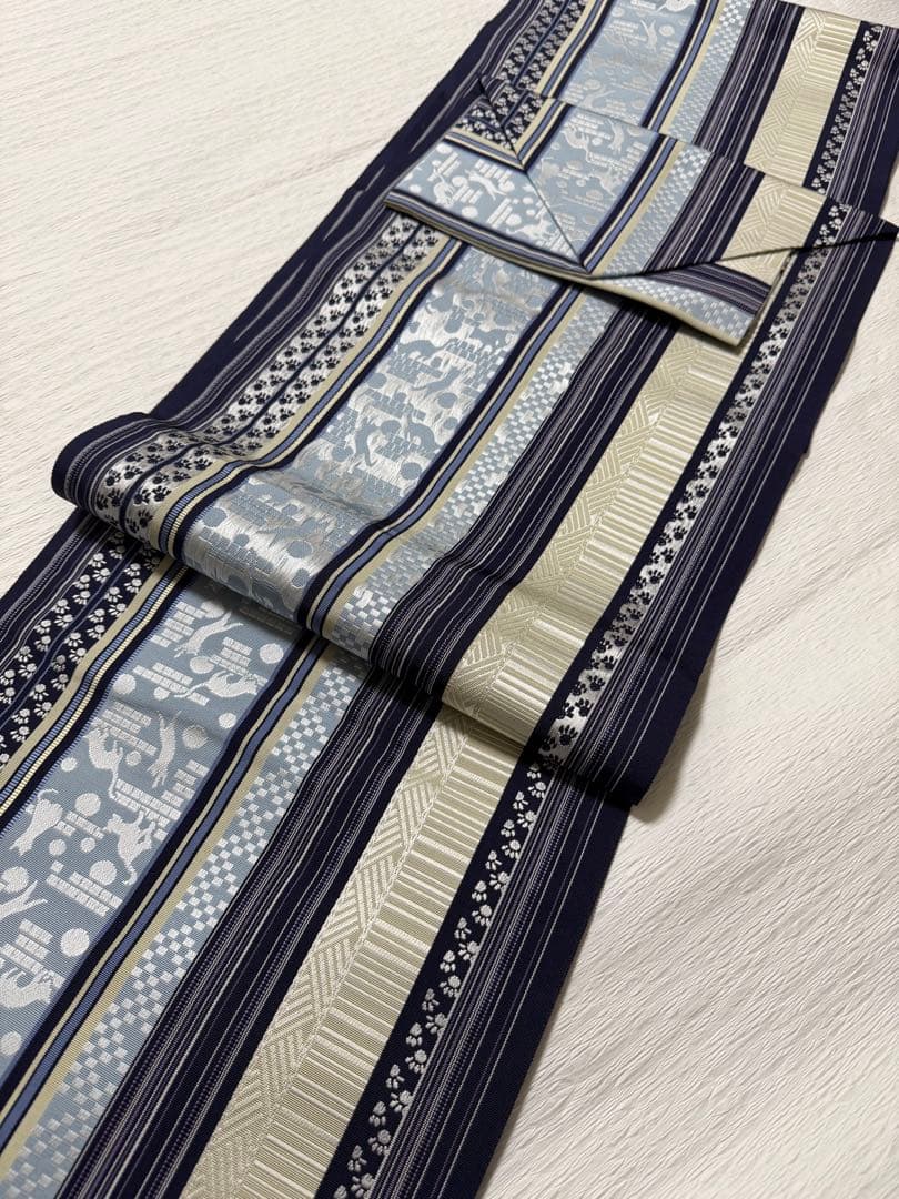 m-45 本場筑前博多織 黒木織物 猫 足跡 名古屋帯 正絹 未使用極美品