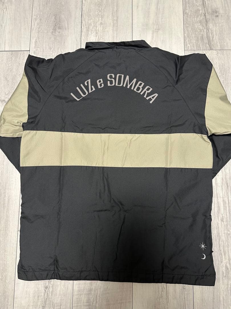 LUZeSOMBRA ピステ・ウィンドブレーカー