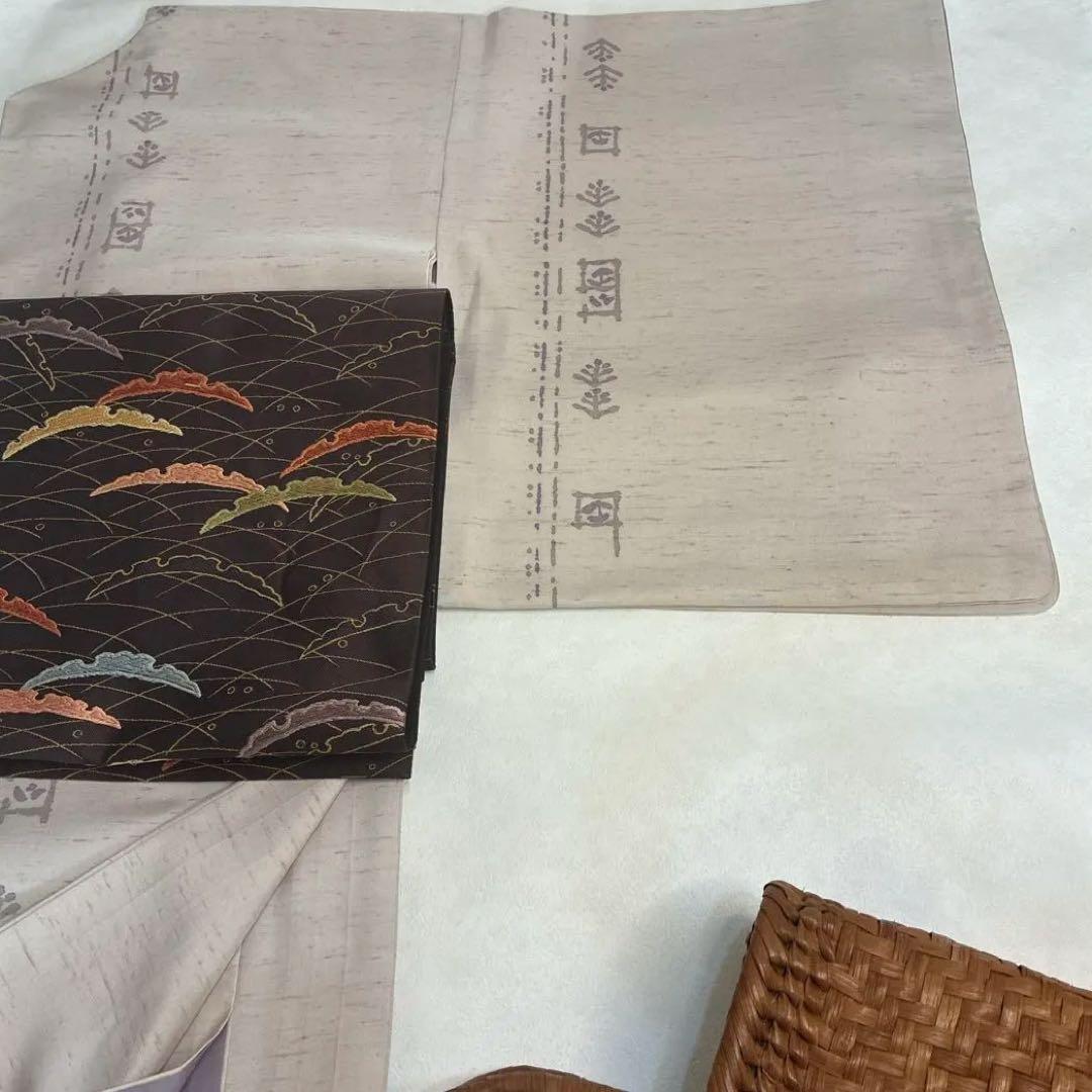 着物単品　袷　白山工房 牛首紬　染色家 市川純一郎　薄小豆色　草花　作家もの