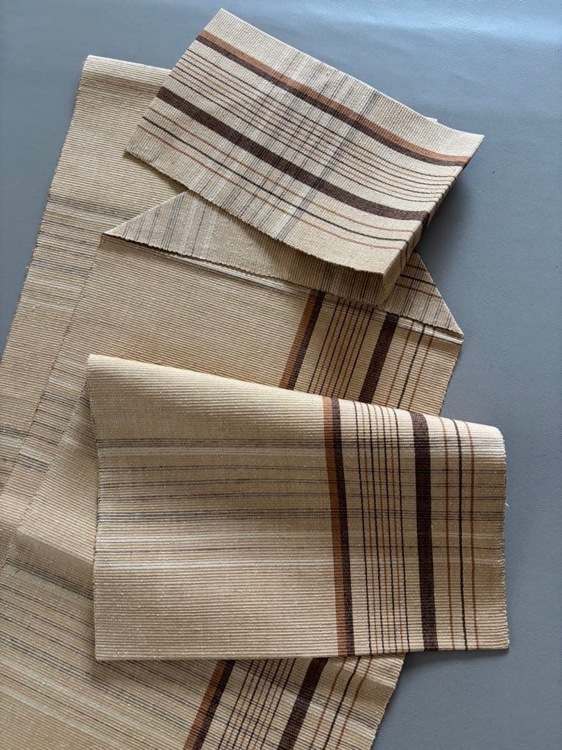 〈お楽しみ価格〉正絹 真綿紬 八寸名古屋帯 薄辛子ベージュ 変わり格子絣