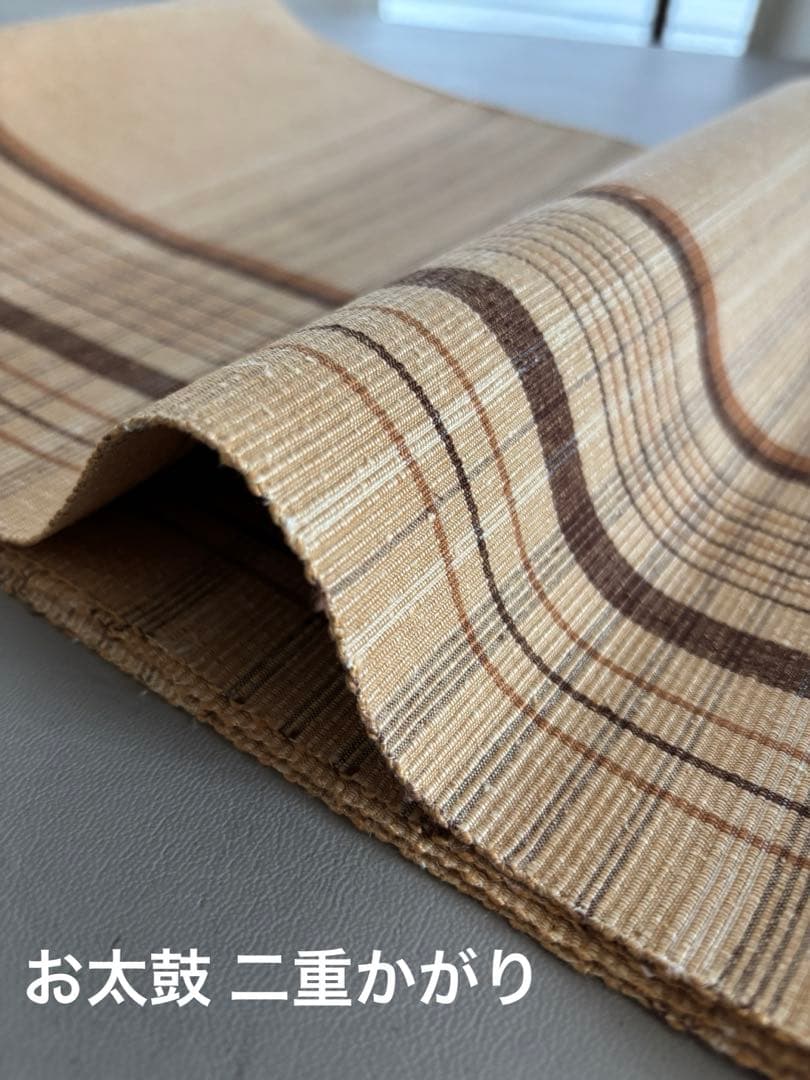 〈お楽しみ価格〉正絹 真綿紬 八寸名古屋帯 薄辛子ベージュ 変わり格子絣