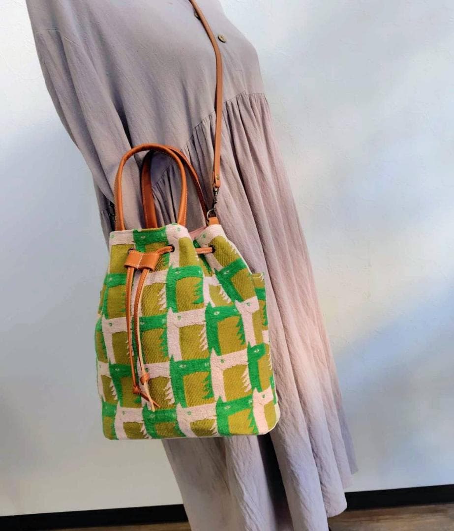 ミナペルホネン/thoroughbredサラブレットマスタード/巾着Lサイズショ