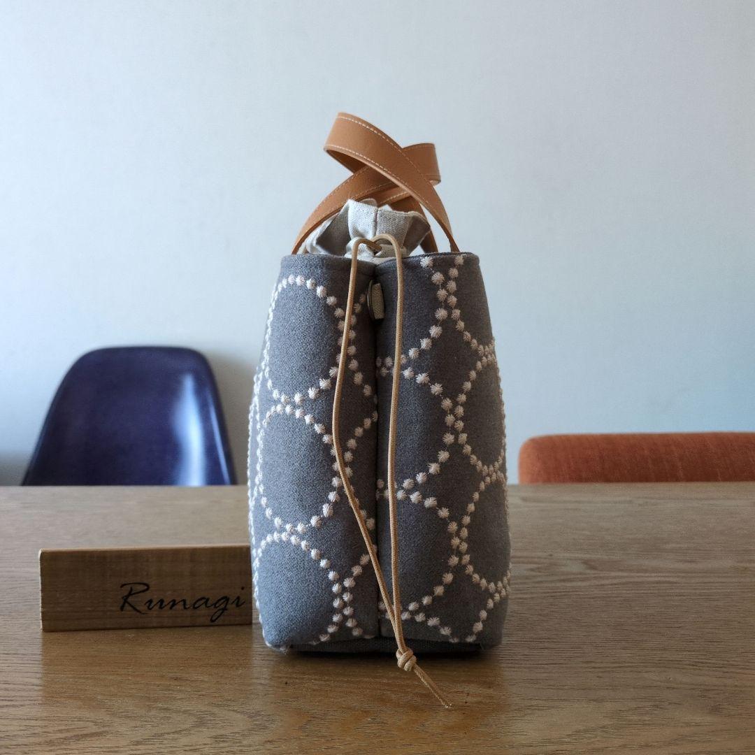 【1572】あおりポケットの巾着バッグ＊ミナペルホネン