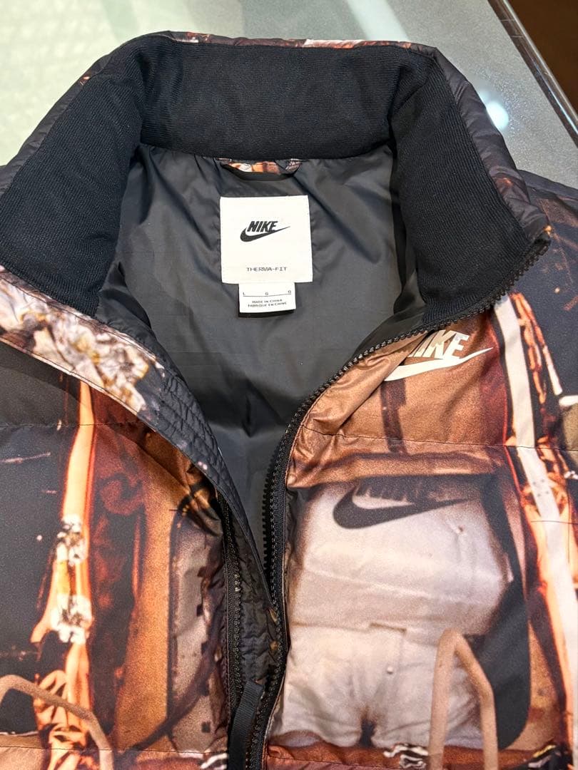 最終価格NIKE グラフィックプリント ダウンベスト Lサイズ