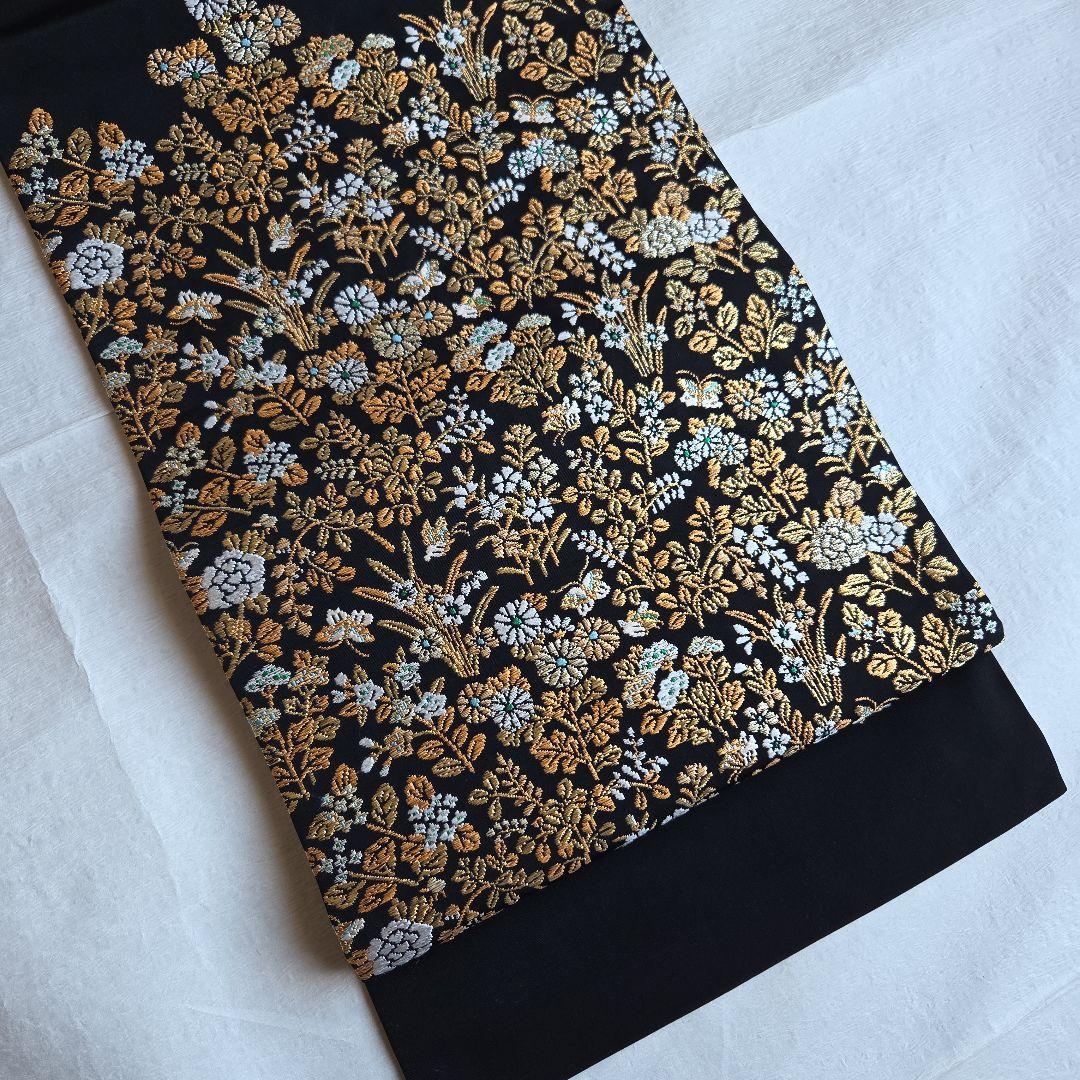 帯屋捨松　細かな煌めきを締める　草花模様の名古屋帯