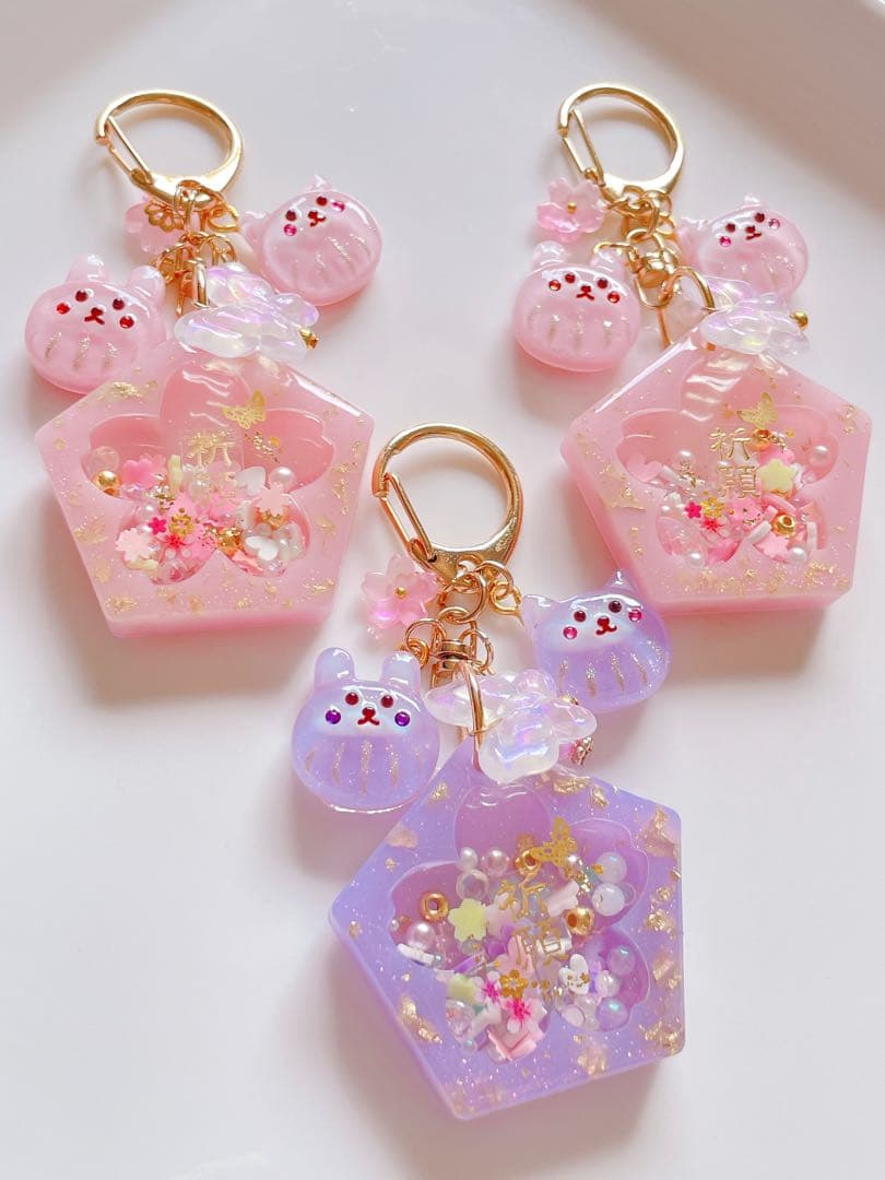 シャカシャカキーホルダー　桜の御守りシェイカー　だるま付き　ひなページ