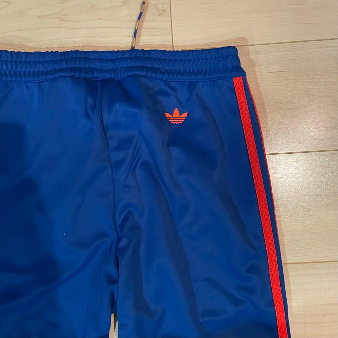 アディダスWales Bonner 青赤ストライプジャージパンツメンズ