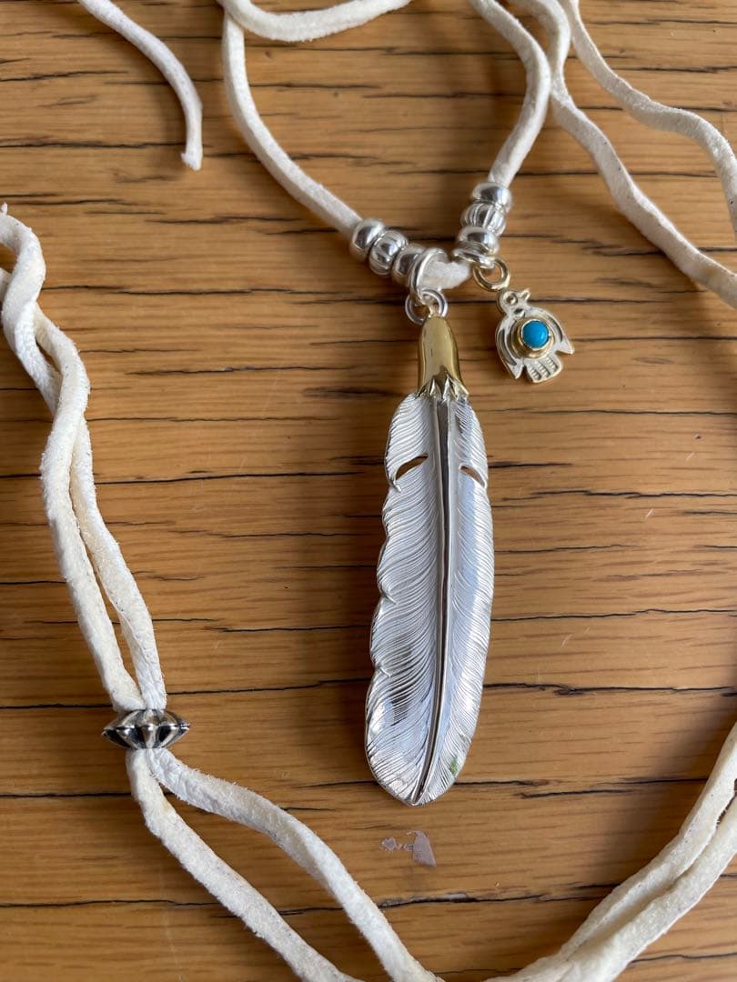 LARYY SMITH ラリースミス　フェザー