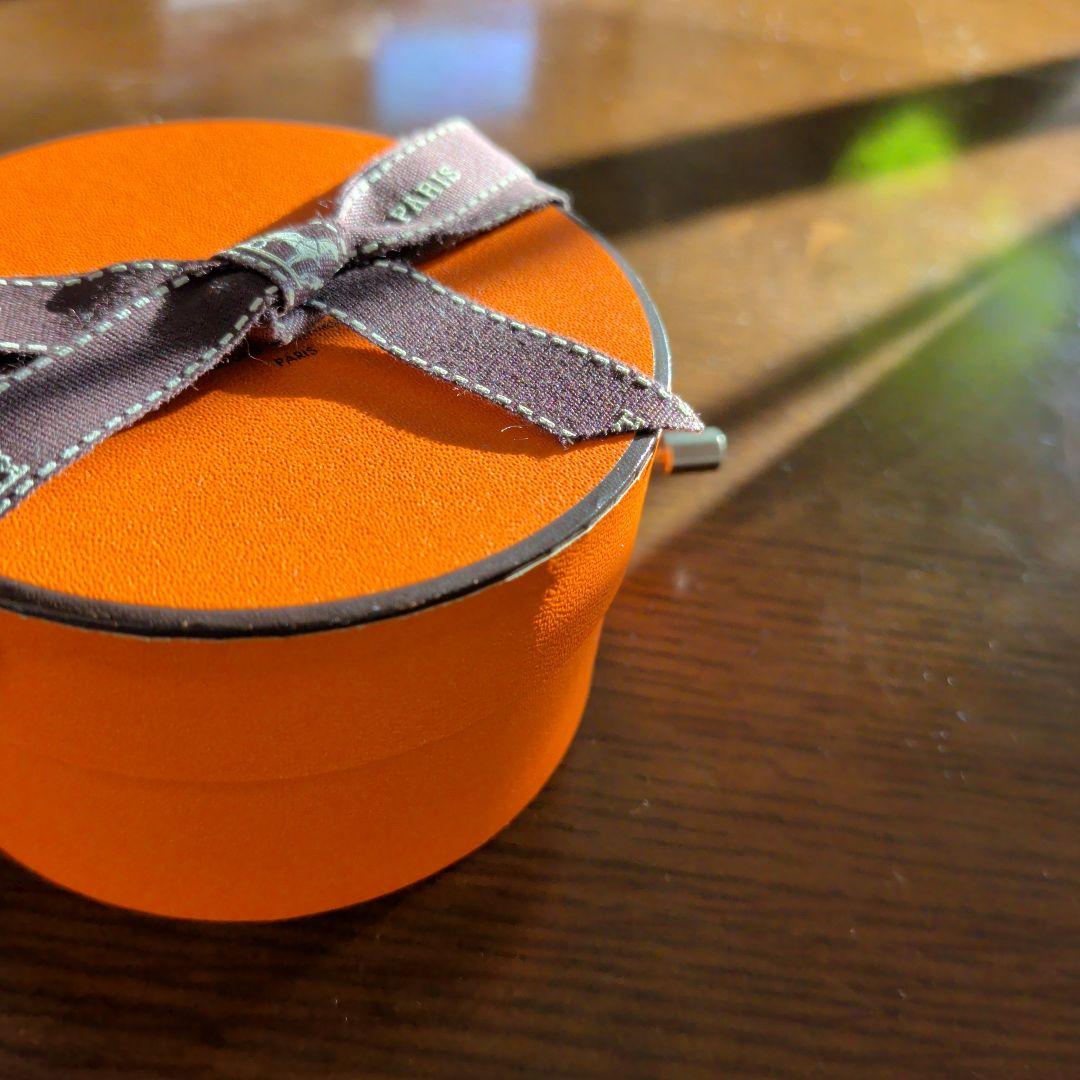 エルメス　HERMES 　非売品　オルゴール　 手巻き　リボン付き丸型