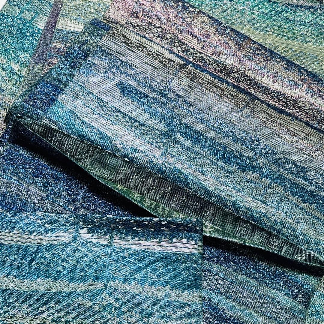 A 204美品袋帯 六通柄 織の宝石佐波理綴　実新特許確定済 志摩半岛定