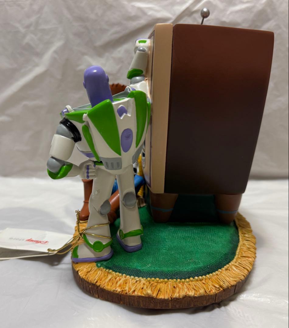 ディズニーストア トイストーリー2 TV型 オルゴール付きスノーグローブ