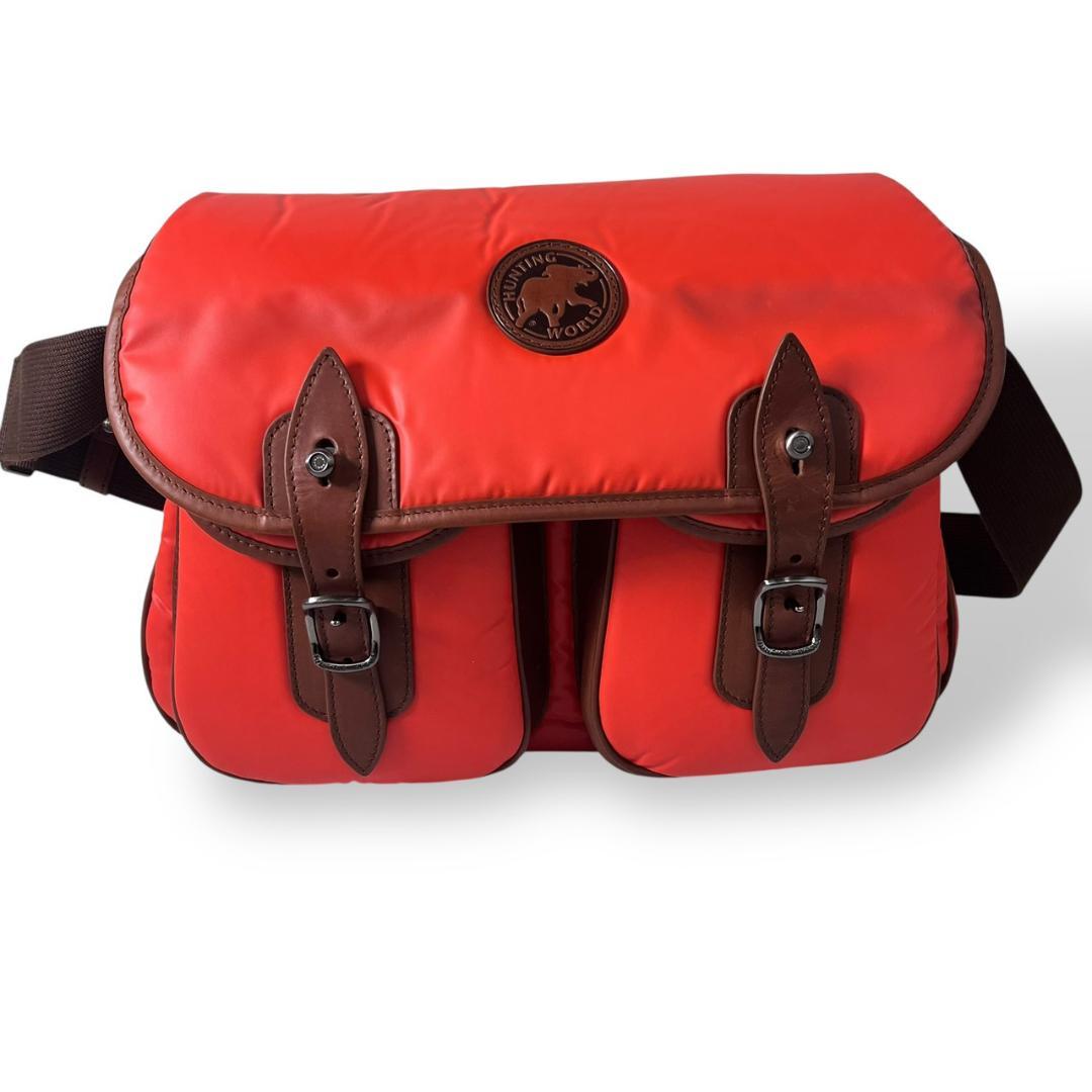 ハンティングワールド バチューサーパス キャリーオール オレンジ バッグ