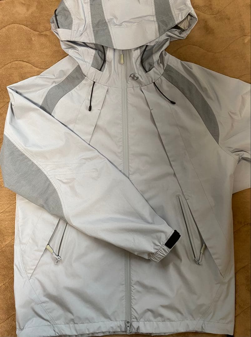 ジャケット・アウター SANSANGEAR WIND SHIELDED JACKET ICE GREY