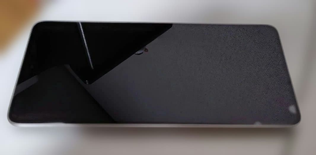 Xiaomi 14 シルバー 本体多少汚れあり　手帳型ケース（未使用）おまけ付き