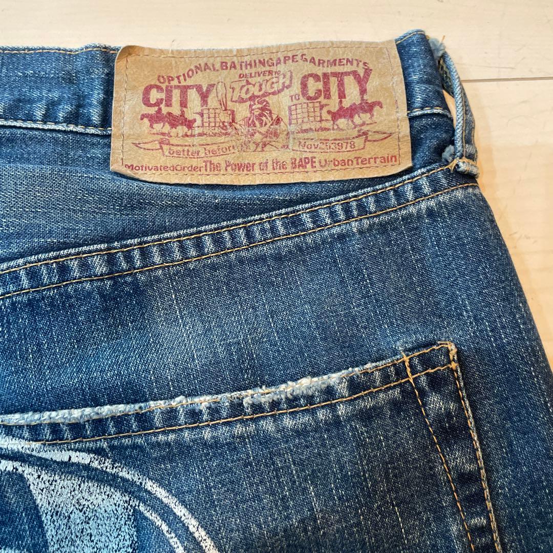 APE デザインデニムパンツ 顔プリント