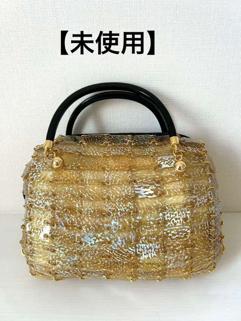 【未使用】ゴールドのハンドバッグ　豚革プレート