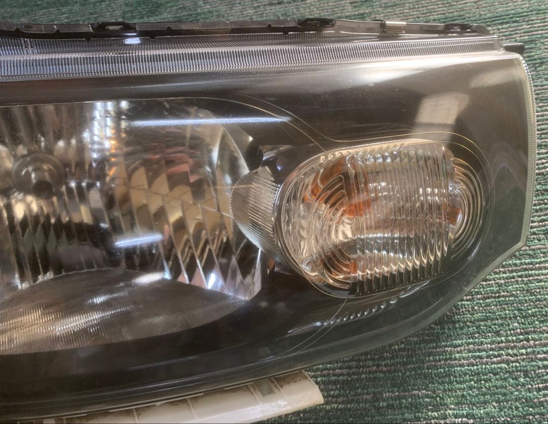 日産 キューブZ12左右ヘッドライト ハロゲンSTANLEY P8190