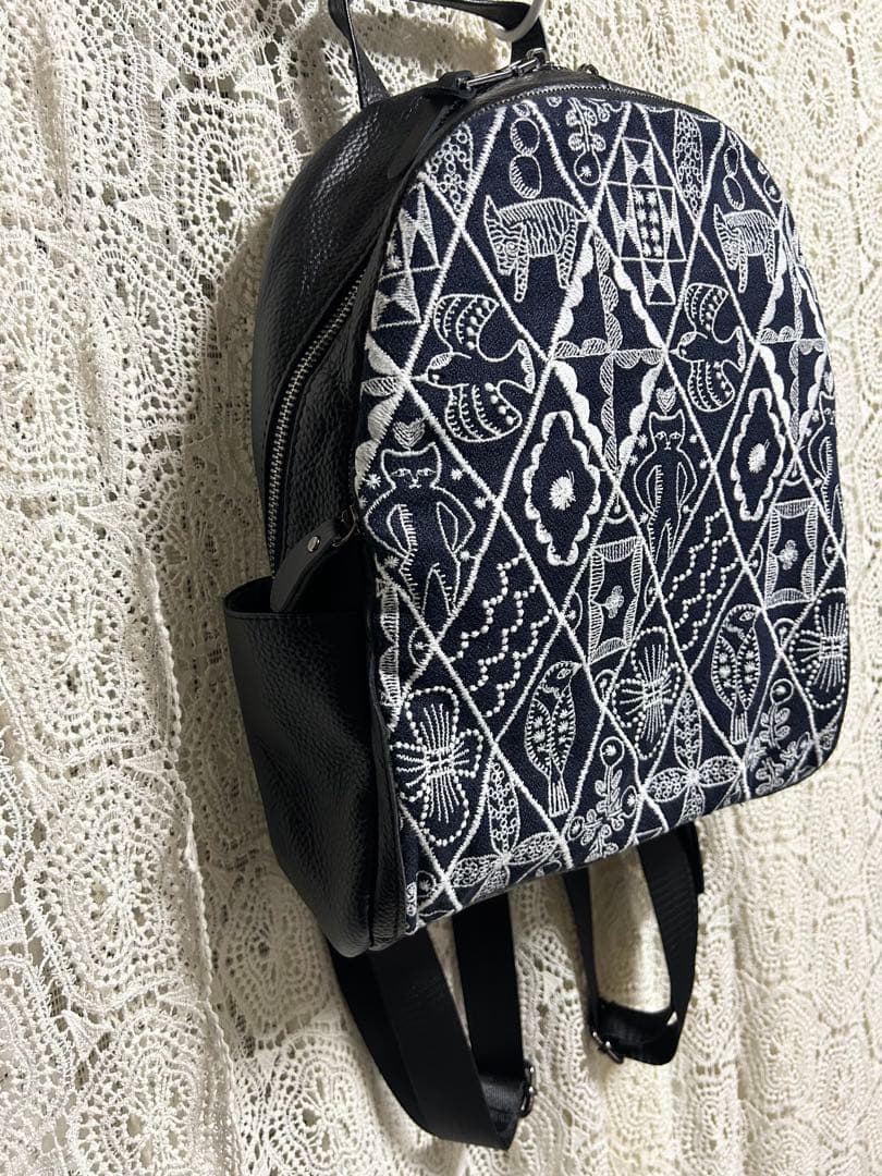 50928A ミナペルホネンハーフハンドメイド本革リュック シンフォニー