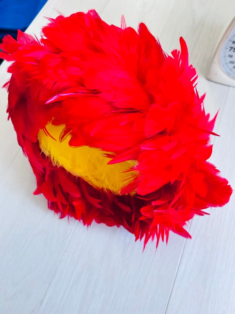 ウリウリ　フラダンス　タヒチアン　赤　羽　黄色　楽器　ハワイ　一体型　２個セット