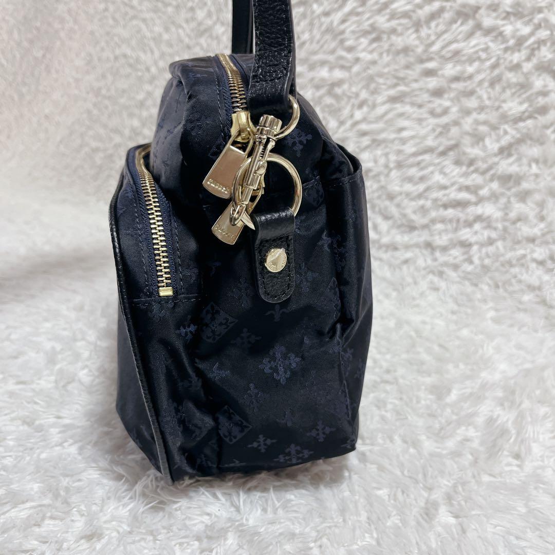 未使用品✨russet ショルダーバッグ　モノグラム　総柄　紺　ロゴ金具　保存袋