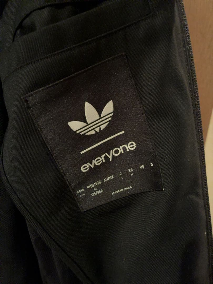 ジャケット・アウター TRACK TOP everyone (BLACK) adidas