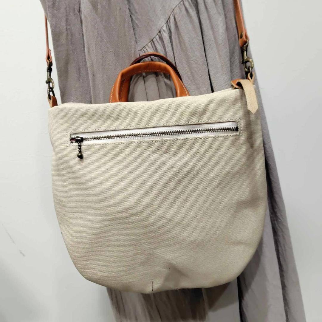 ミナペルホネン/thoroughbredサラブレットネマスタード/ロングミニラウ