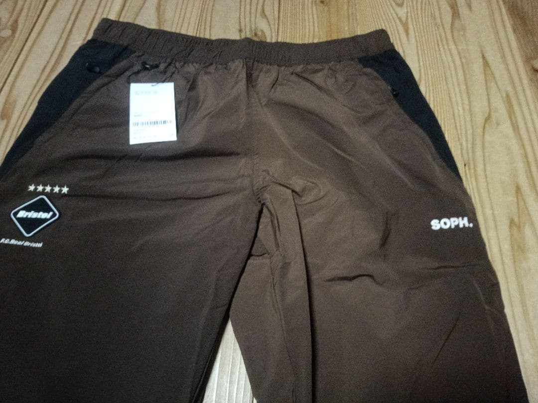 F.C.RealBristolSOPH.ウォームアップパンツブラウン✕ブラックL