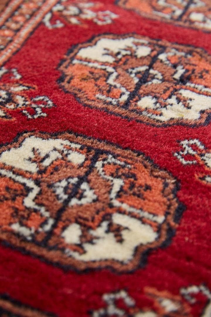 ヴィンテージラグ　トライバルラグ　パキスタン（95×33cm）赤　茶　オレンジ