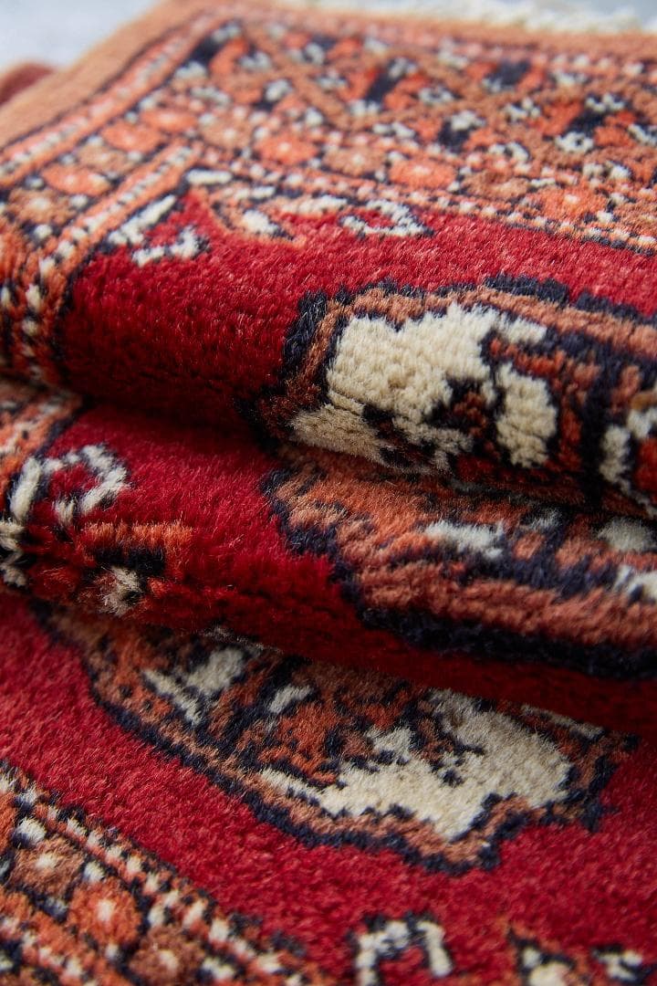 ヴィンテージラグ　トライバルラグ　パキスタン（95×33cm）赤　茶　オレンジ