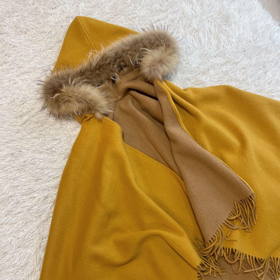 美品 グレースコンチネンタル ダイアグラム ポンチョ ラクーンファー フード