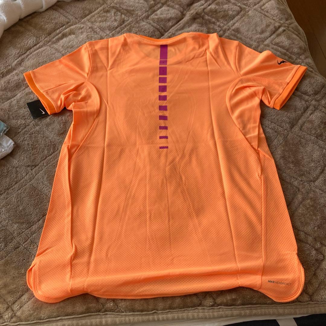 Nike ラファエル・ナダル ゲームシャツ オレンジ