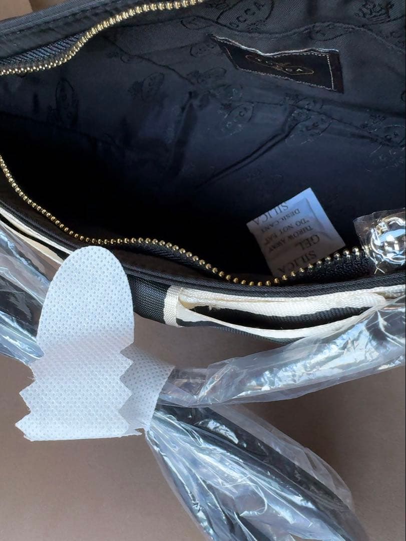 Mari BICOLOR RIBBON POCHETTE ポシェット