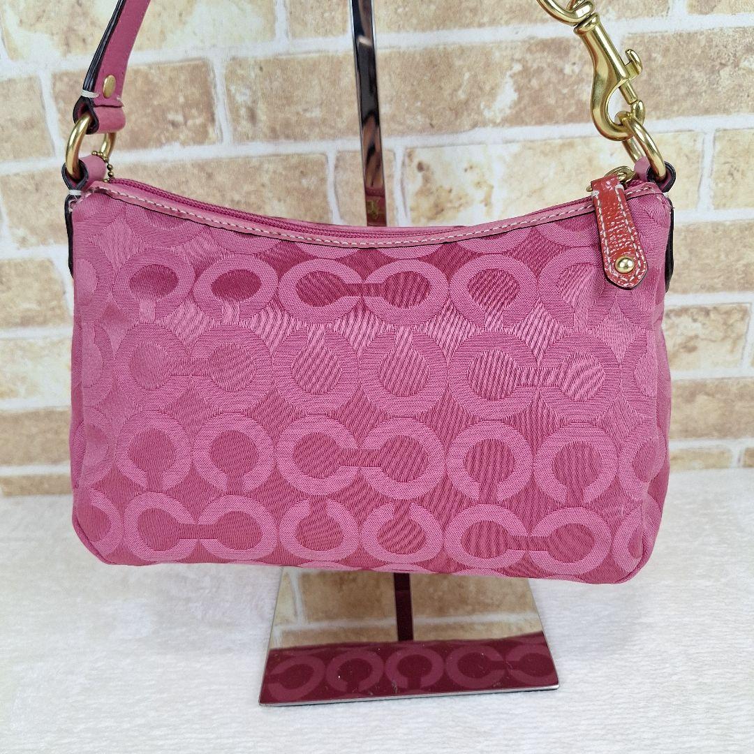 COACH　コーチ　アクセサリーポーチ　キャンバスレザー　馬車　ピンク