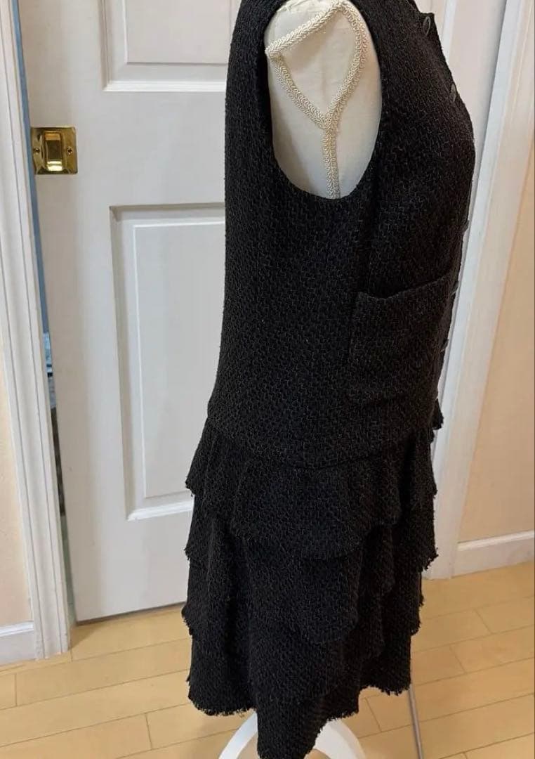 シャネルシャネル黒フリルワンピースサイズ42ツイード素材