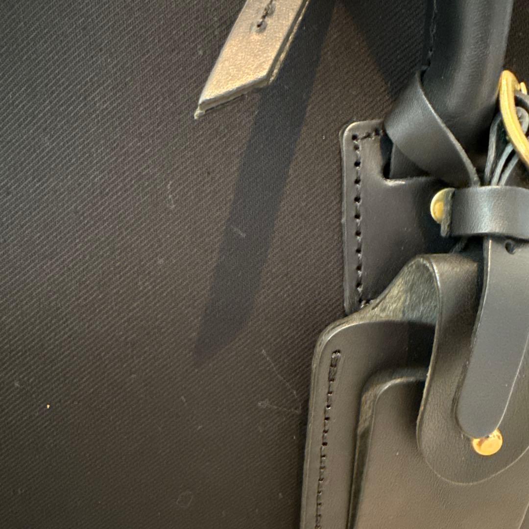 SLOW　TRADITIONAL コットンサージ/ラウンドブリーフケース