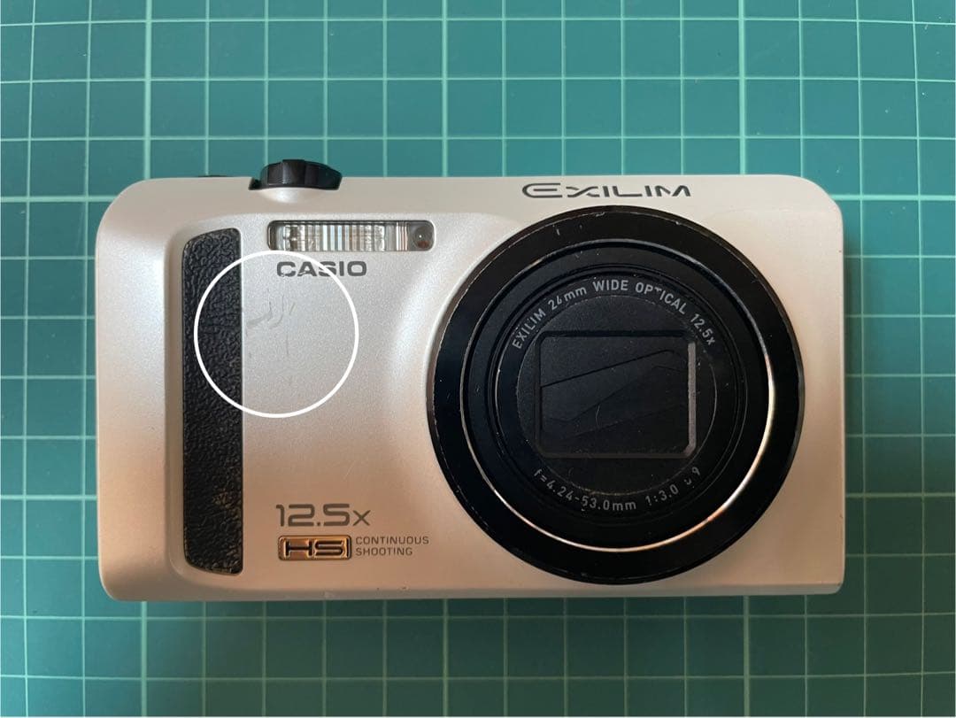 CASIO EXILIM EX-ZR100 ホワイト [電池挿入ふたロック不良]