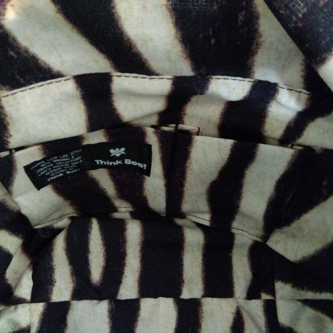 シンクビー　バッソサバーナバック　ブラック/アニマル柄（収納袋付き）