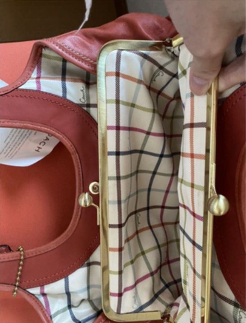 コーチ　オレンジ　エルゴレザープリーテッドフレームドサッチェル