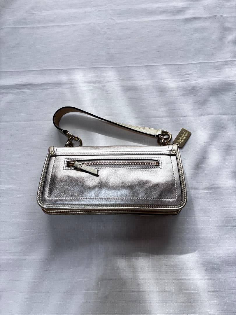 バッグ Coach legacy stripe turn lock llic