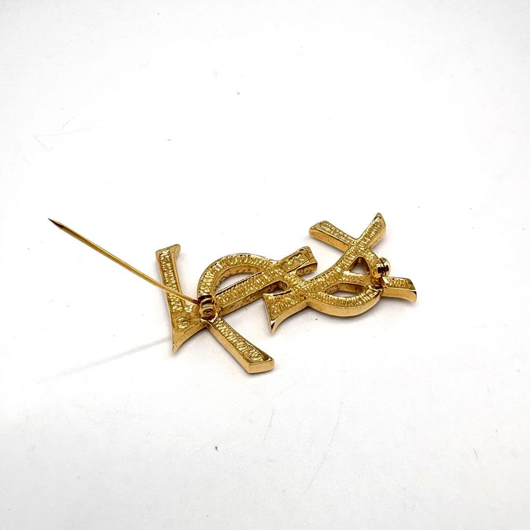 【極美品 】イヴサンローラン ブローチ カサンドラ ロゴ YSL ゴールド 人気